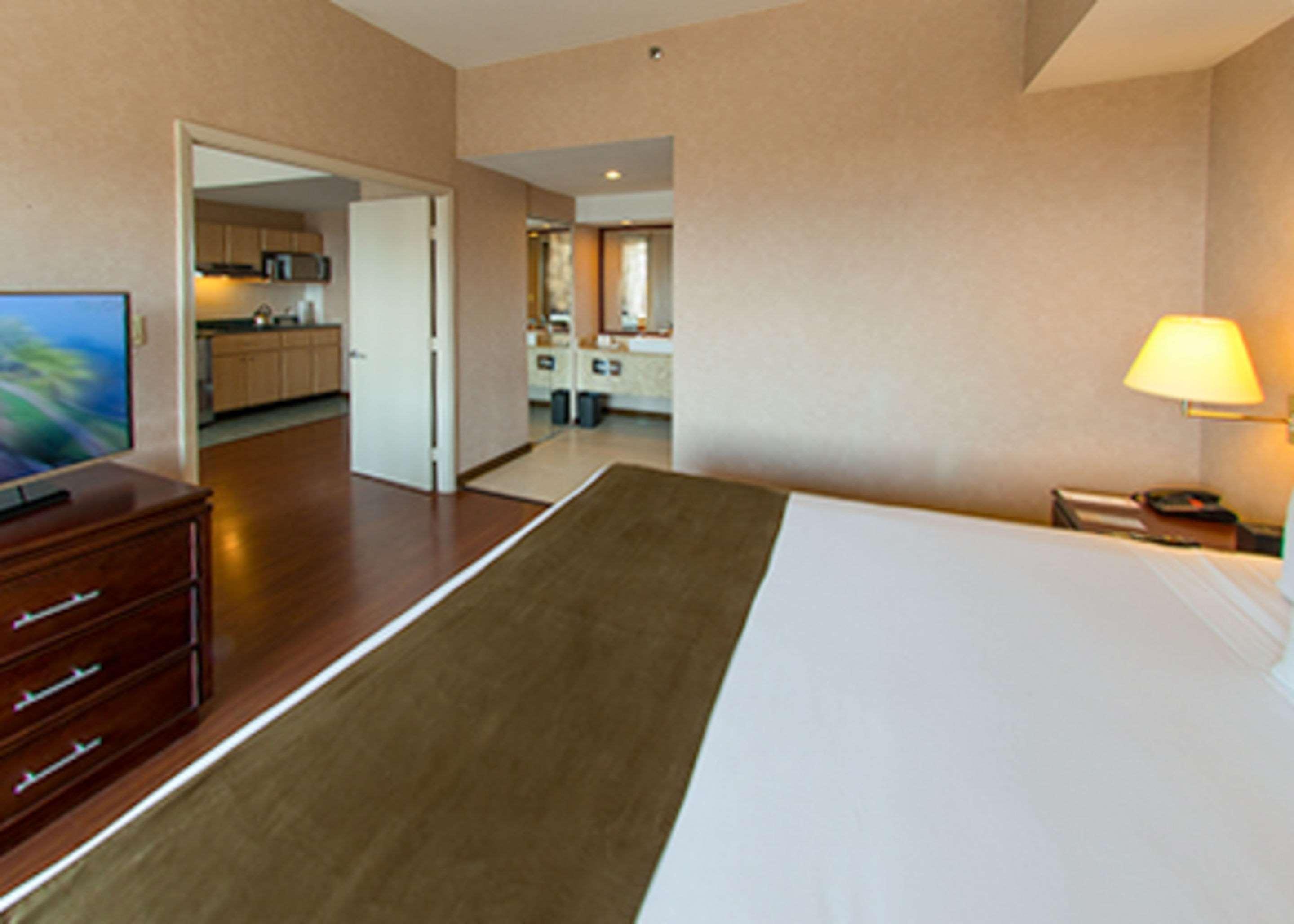 ホテル クラリオン スイーツ ガテマラ シティ グアテマラシティ エクステリア 写真 A typical bedroom in a typical apartment